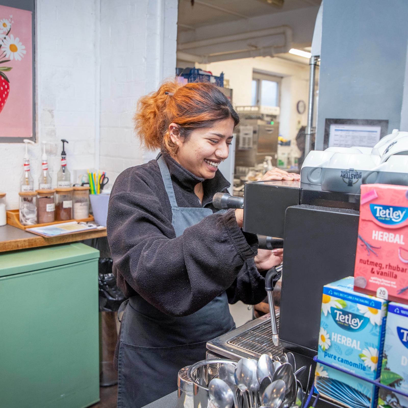 Barista at the espresso machine